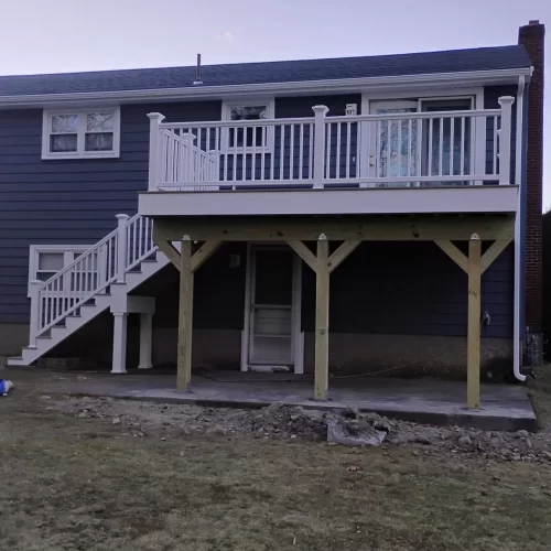 newly installed deck on back of house