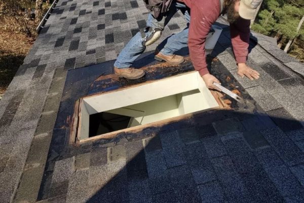 Man repairing roof